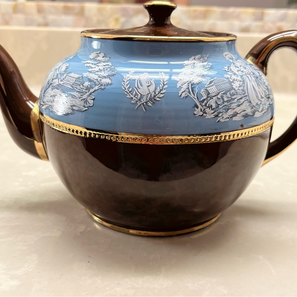 Elegant Brown and Blue Ceramic Teapot